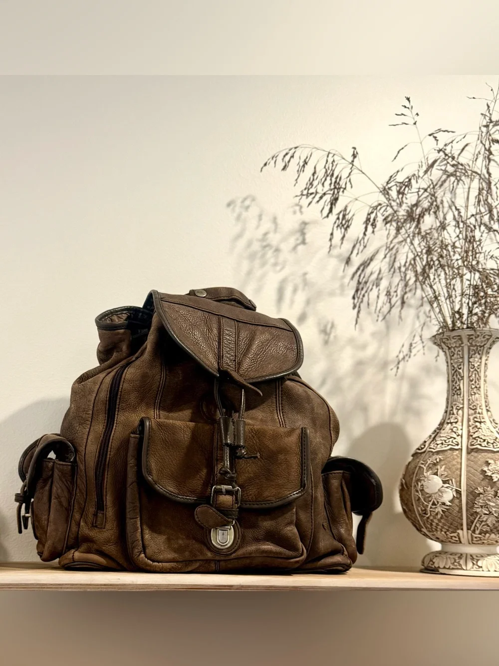 Men's Brown Leather Backpack with Front and Side Pockets